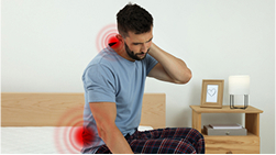 A person in pain, representing pain and suffering coverage.